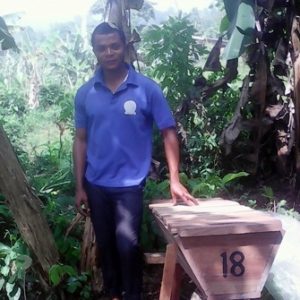 Thompson with beehive